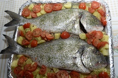 Baked sea bream with potatoes,cooking bream fillets