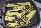 Grilled zucchini on grill