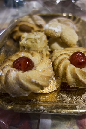 Italian almond biscuits with cherry on top